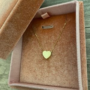 Small 14k Gold heart necklace. Small scratch on front, barely noticeable.